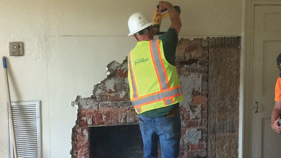 Uncovering fireplaces in student rooms