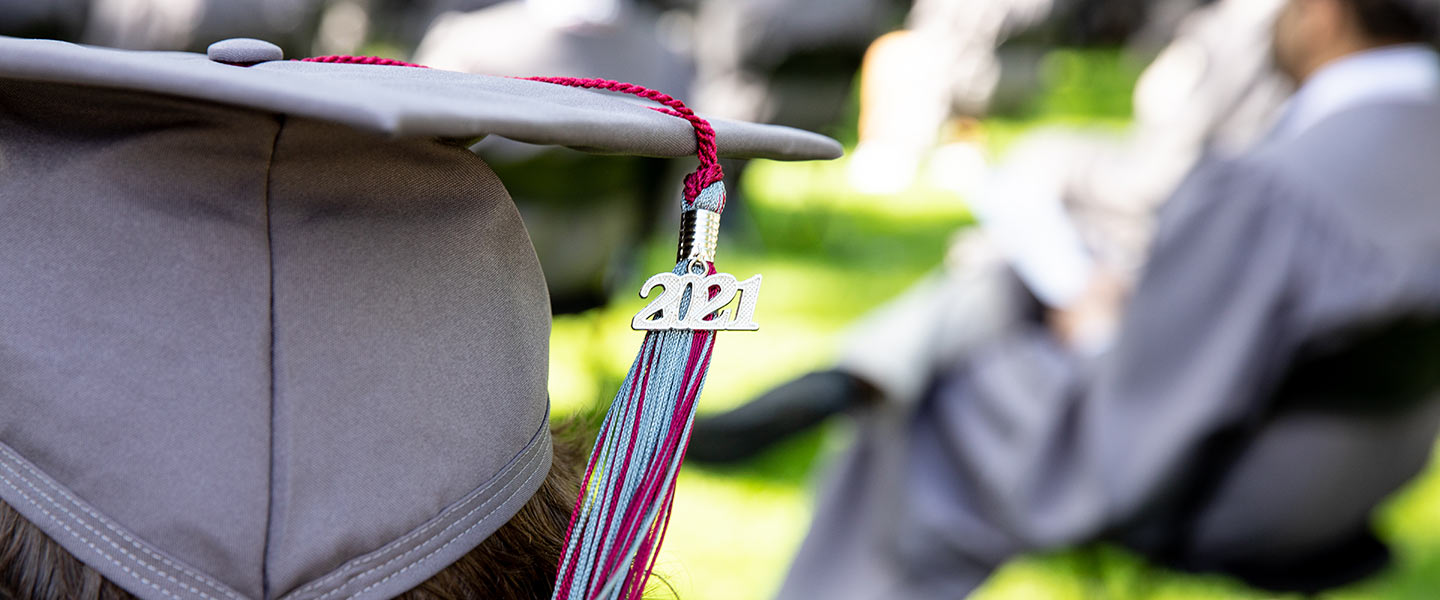 Close-up photo of a 2021 graduate's mortarboard as he attends Hampden-Sydney College commencement