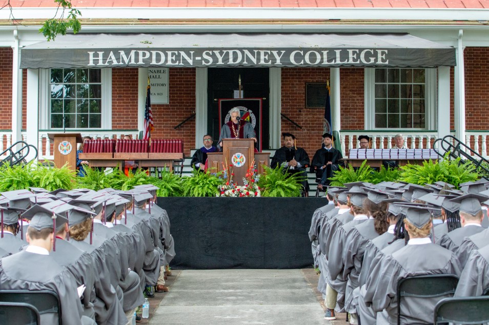 students attending the commencement ceremony at Venalble Hall lawn