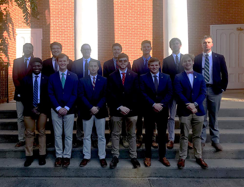 Fall 2021 ODK inistiates standing on the steps of College Church
