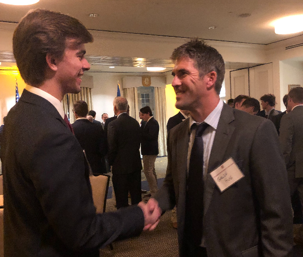 Men in suits shaking hands