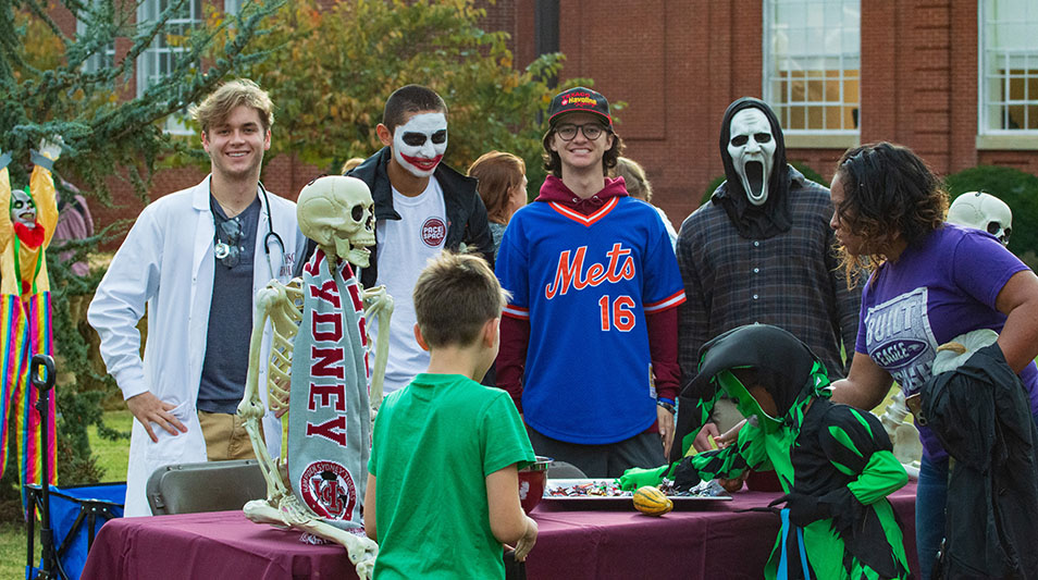 H-SC students handing out Halloween candy
