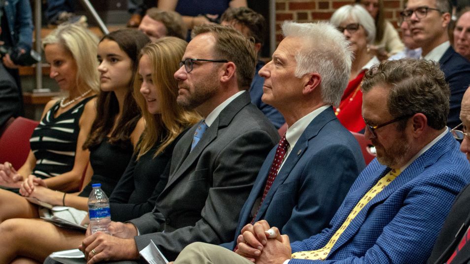 Stimpert, Nickerson, and Harrison listening intently