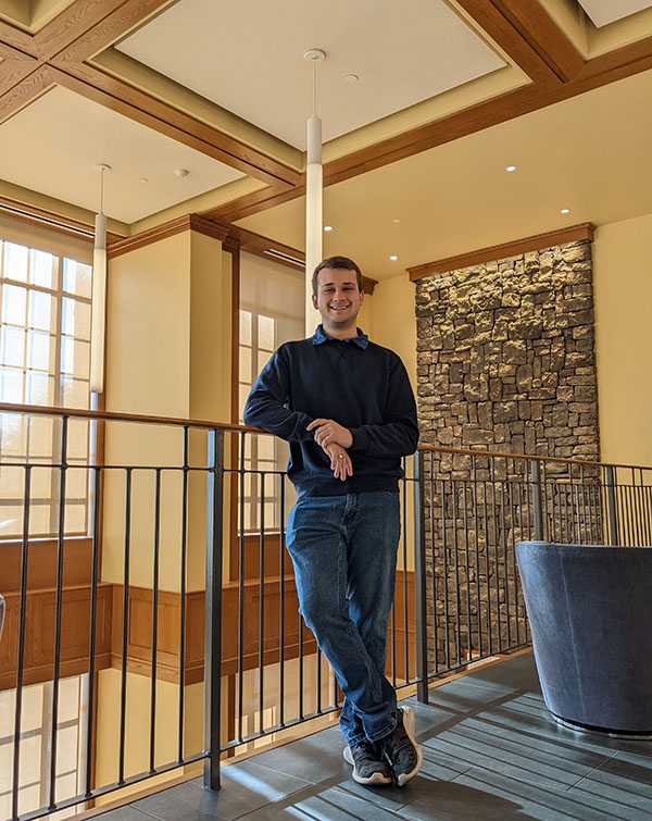 Taylor McGee standing on the terrace level of the student center