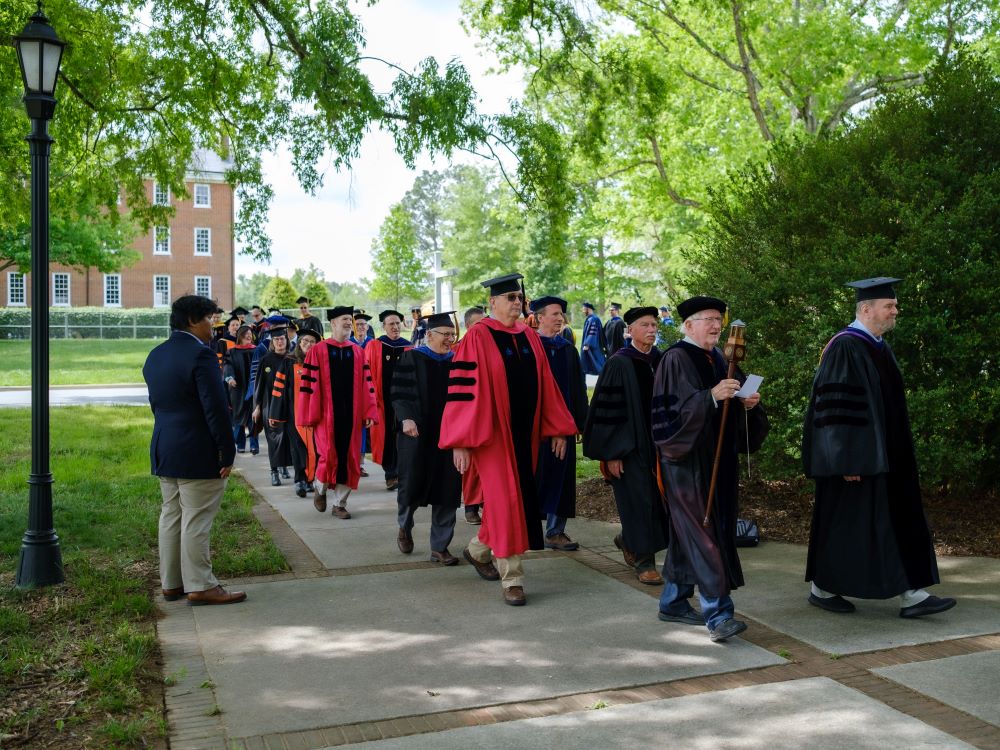 Faculty processing in regalia at convocation ceremony