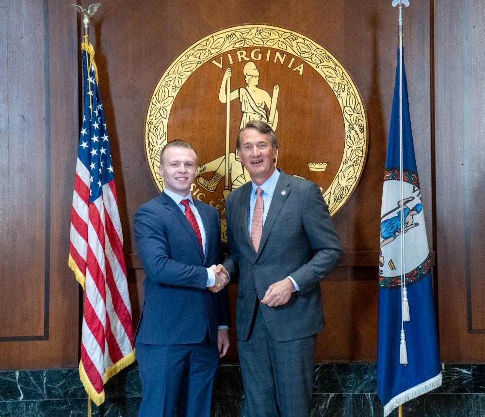 Finley Lee shaking hands with the Governor of Virginia