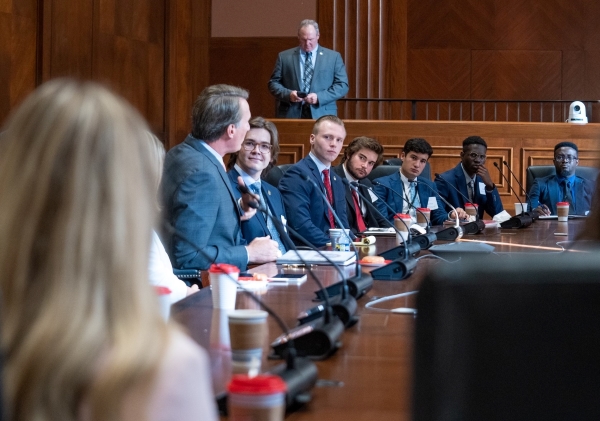 Finley Lee and other students listening to the Governor of Virginia speak