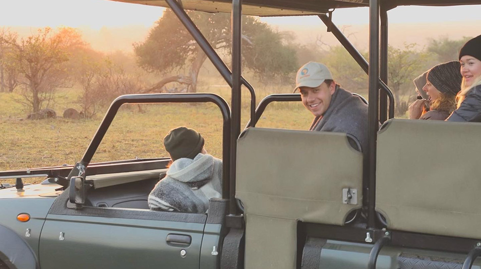 William Gardner in a jeep in Africa