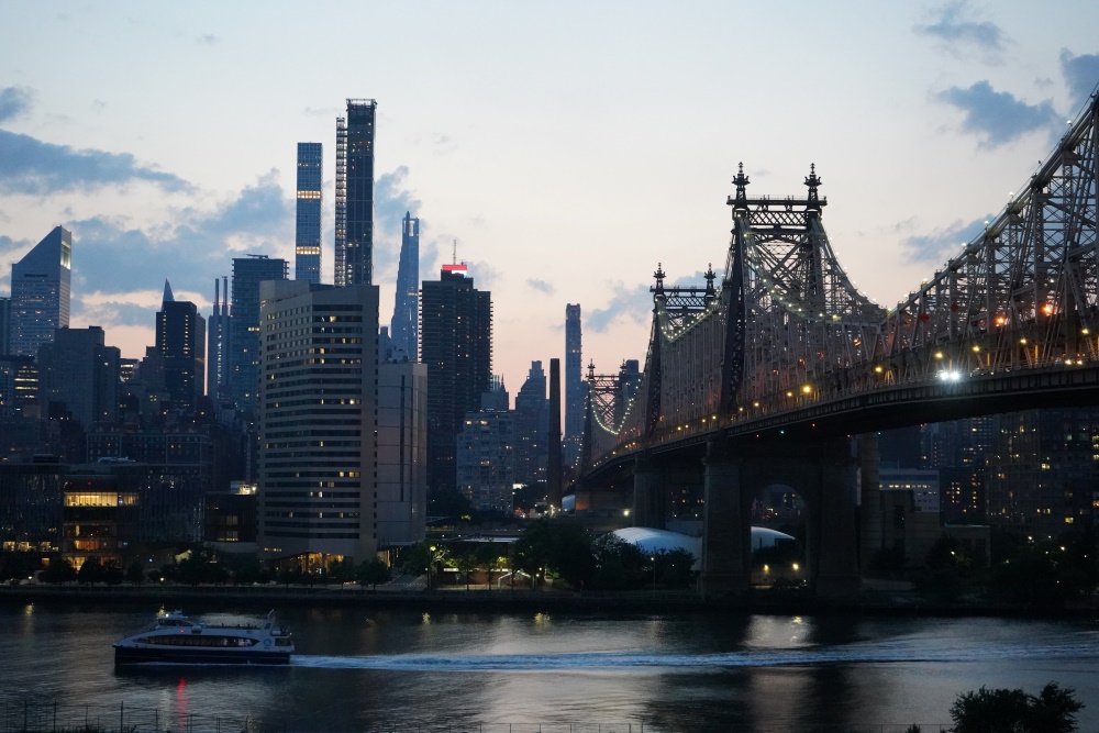 Queens, New York bridge and skyline at dusk, by Uran Kabashi-