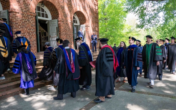 faculty in regalia enterring convocation ceremony