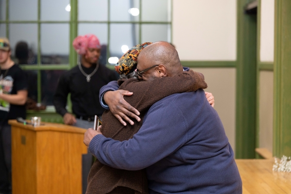 Friends embracing at the 2025 MAM Weekend reunion