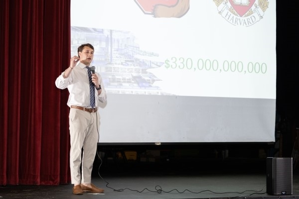 student presenting research onstage