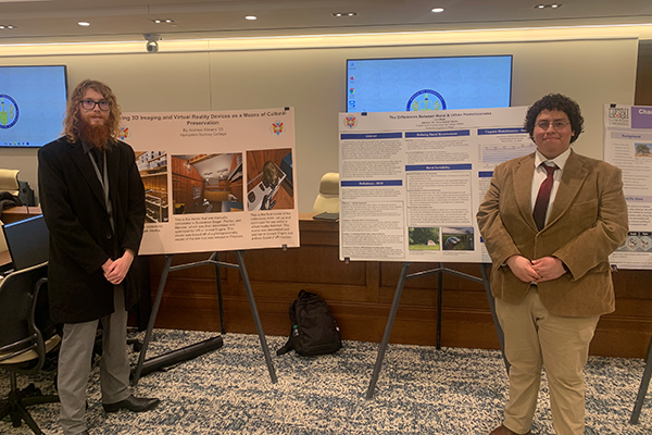 students from H-SC standing in front of their poster research