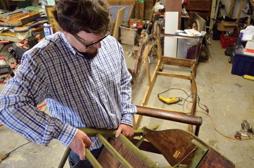 Gordon Johnson '97 working in his shop