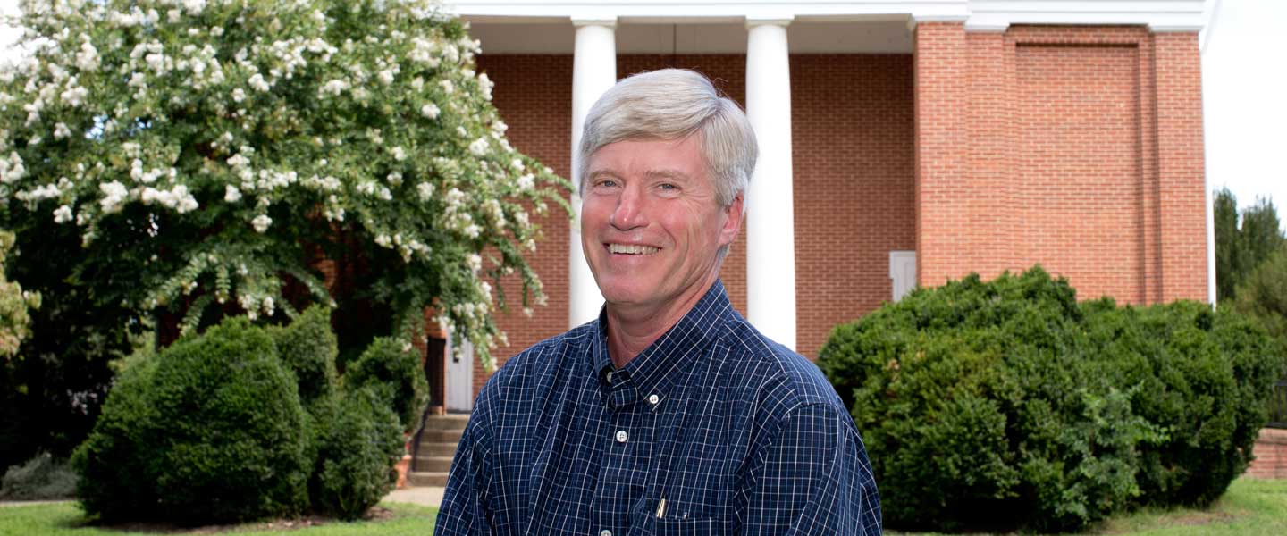 Keith Leach in front of College Church ay Hampden-Sydney College