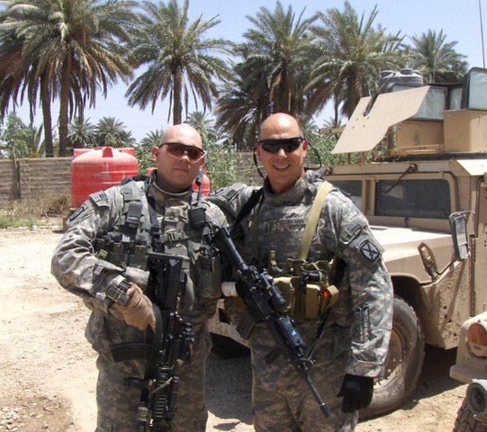 Matt Eversmann and friend in combat gear