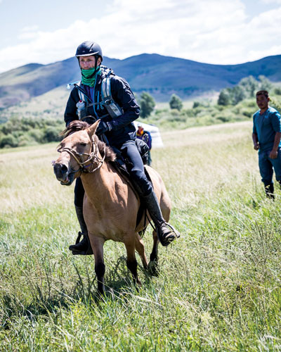 Pierce Buckingham on horseback