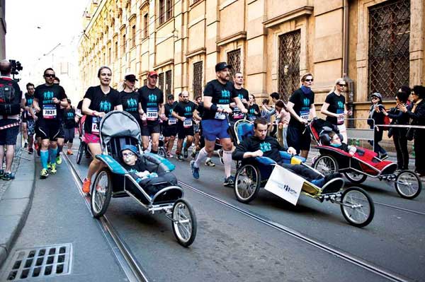 Scott Keel '02 running a race with special needs children