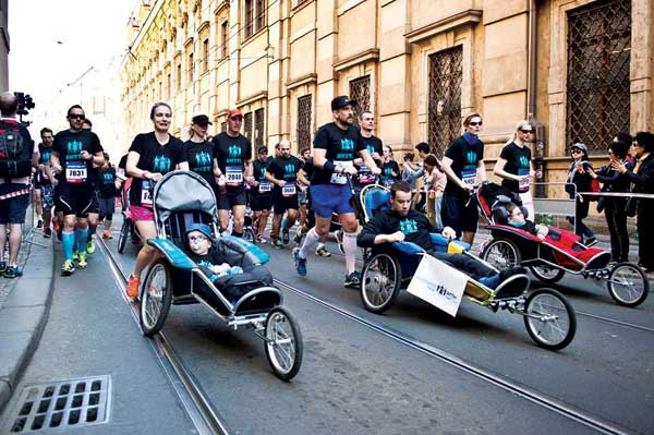 Scott Keel '02 running a race with special needs children