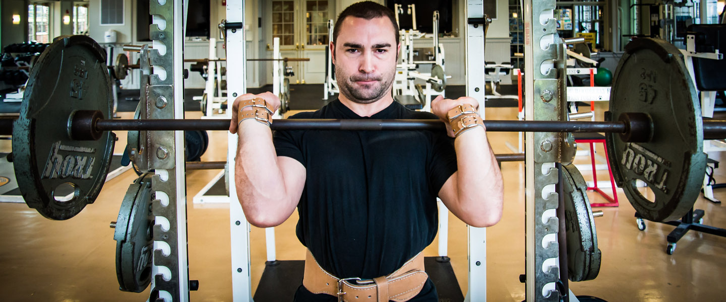 Raphael Sydnor '01 lifting weights