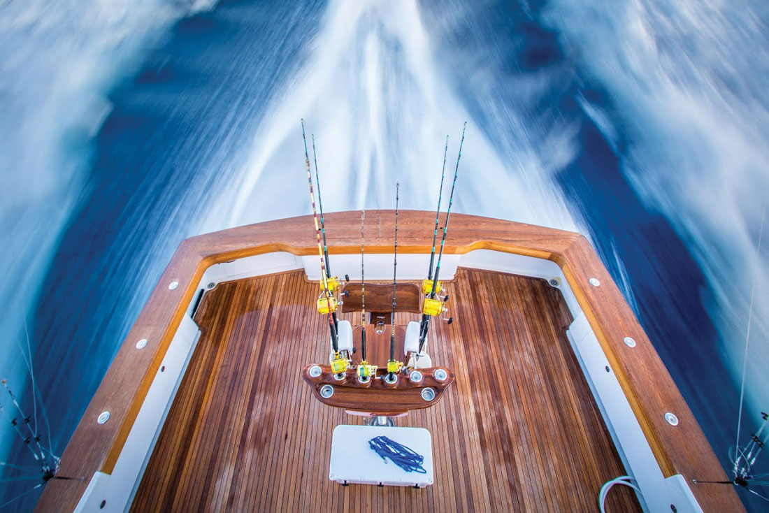 Tom Spencer photography, looking off the back of a boat