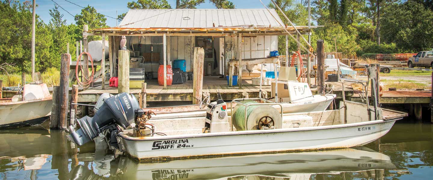 Tom Spencer photography, a boat docked at Cedar Island