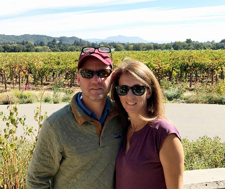 David and Heather Ewing in a grove