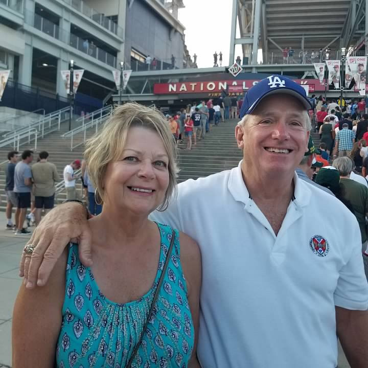 Phile Spencer and wife at baseball game