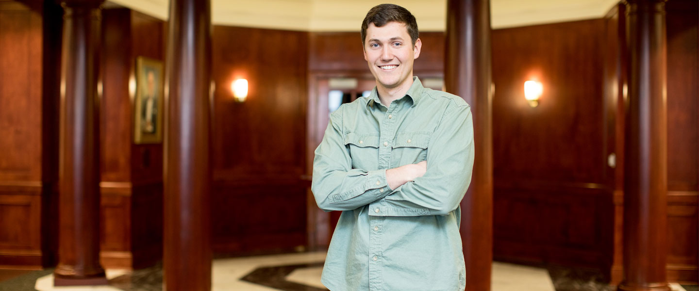 Will Fussy '18 standing in the Bortz Library