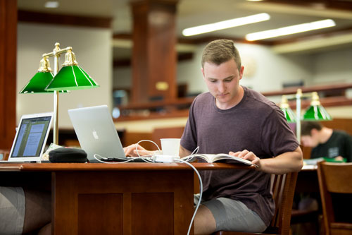 Max Dash doing research in the Bortz Library