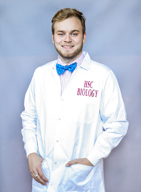 Harrison Whaley '21 in a biology labcoat