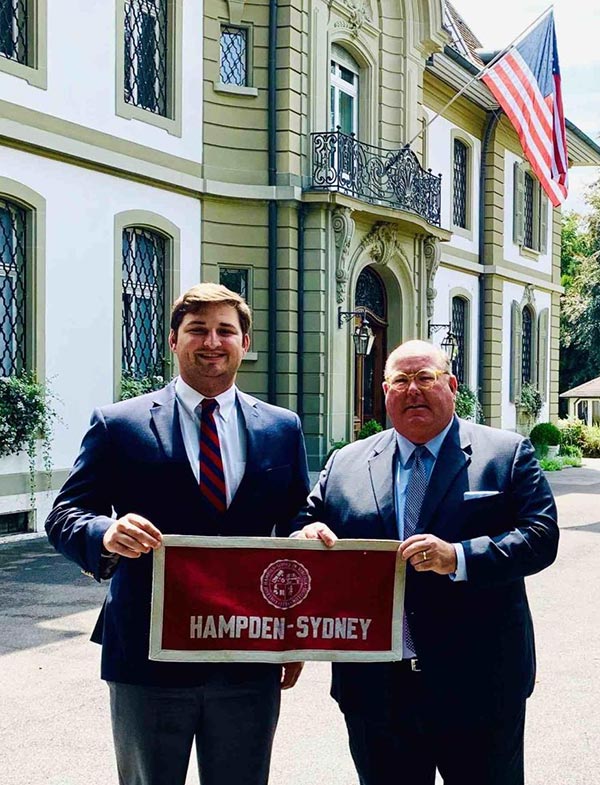 Cal Mitchell standing with Ed Mc Mullen at the Swiss embassy
