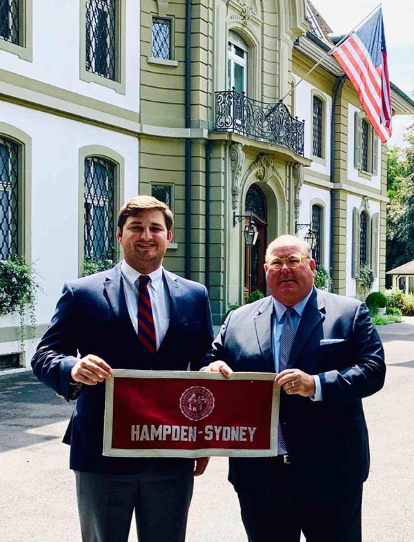 Cal Mitchell standing with Ed Mc Mullen at the Swiss embassy