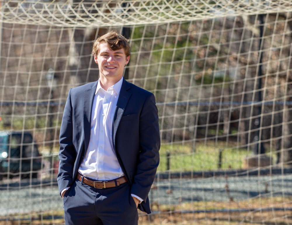 William Thornton standing in front of a soccer net