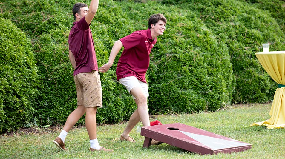 Students playing corn hole at Hampden-Sydney College