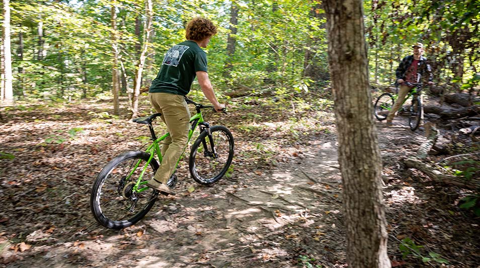 A student biking the Wilson Trail at Hampden-Sydney College