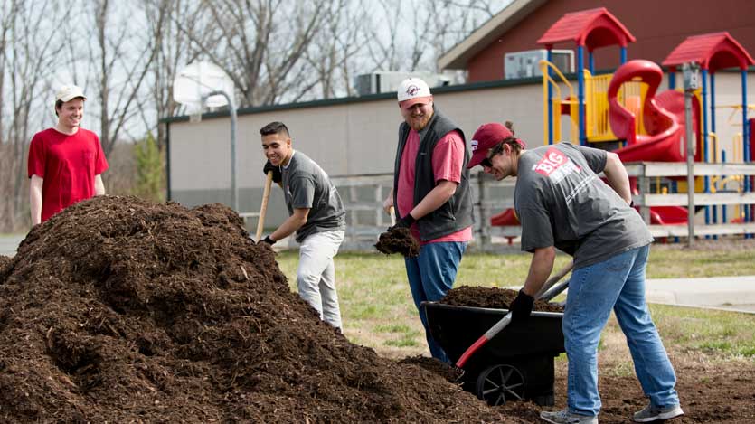 Students doing a beautification project for their volunteer service